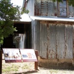 Some old building and a sign.