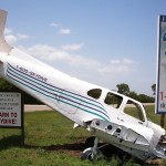Crashed airplane as advertisement for skydiving.
